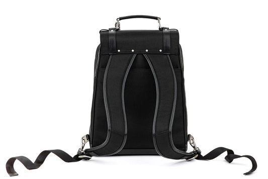 A black backpack made from recycled materials with straps on it.
The Patricia Medical Bag In Black from IYASU.