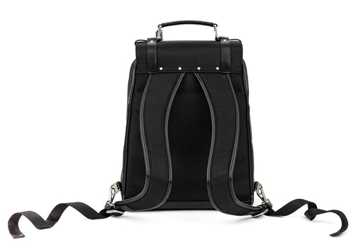 A black backpack made from recycled materials with straps on it.
The Patricia Medical Bag In Black from IYASU.