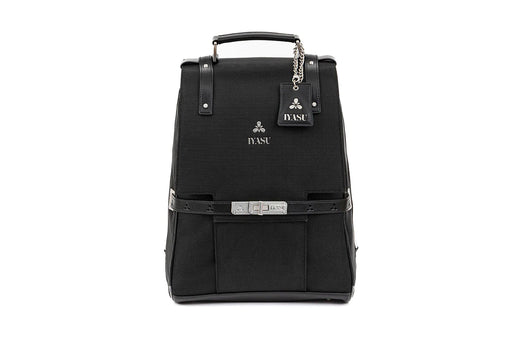 A black eco-friendly backpack with a strap and a handle, The Patricia Medical Bag In Black by IYASU.