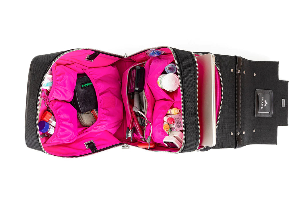 A pink eco-friendly Patricia Medical Bag in Black by IYASU with a lot of items inside.