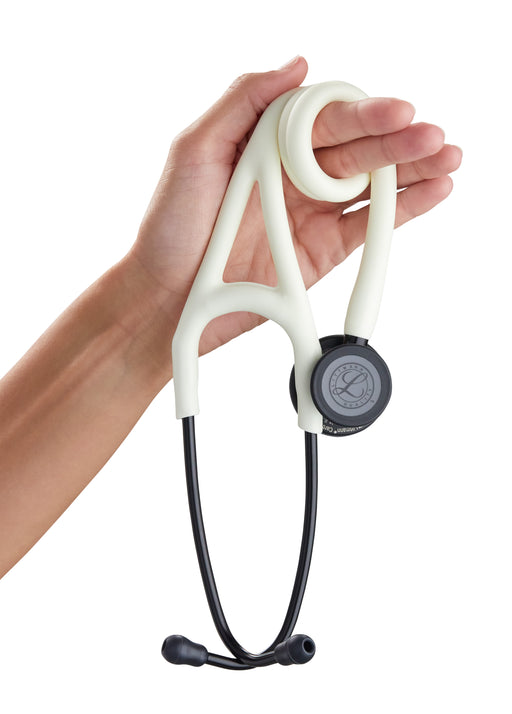 A hand holding a 3M™ Littmann® Cardiology IV Diagnostic Stethoscope: Satin Alabaster Tube 6186C against a white background.