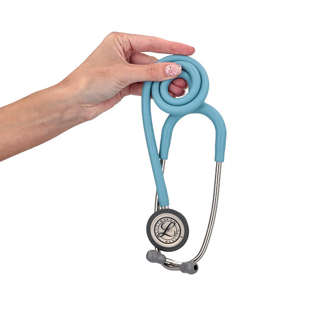 A hand holding a 3M™ Littmann® Classic III Monitoring Stethoscope: Satin Marine Blue Tube 5912C against a white background.
