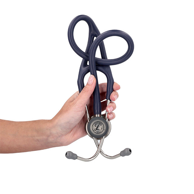 A hand holding a 3M™ Littmann® Cardiology IV Diagnostic Stethoscope, formed into a treble clef shape, against a white background.